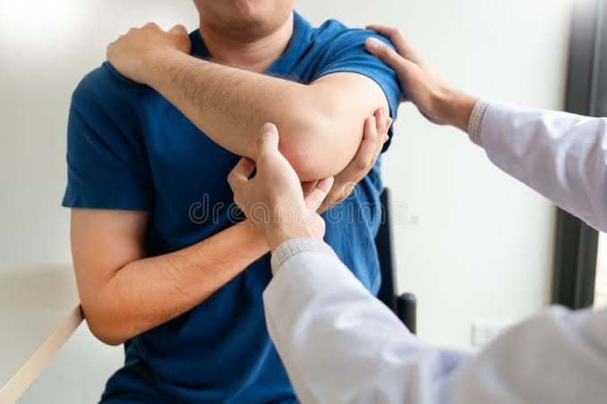 Manual joint mobilization of the elbow